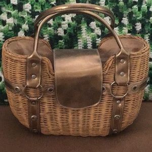 Rattan woven handbag with gold trimmings